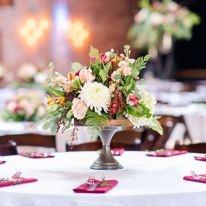 closeup of a floral centerpiece at a gala event