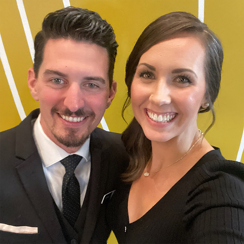 Drew and Holly Holloway dressed in black for a formal event